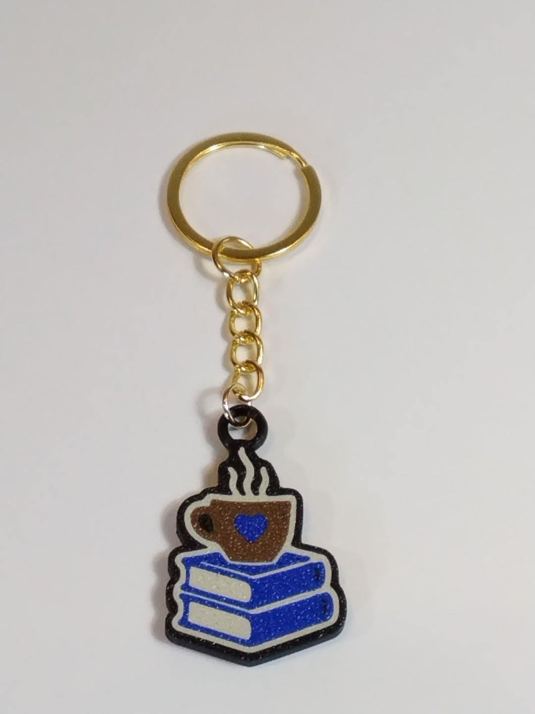 Chaveiro Biblioteca Encantada – Leve Suas Histórias com Você